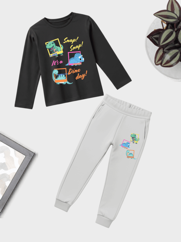 Unisex kids Snap Snap dinosaur theme co-ord set made from soft cotton, featuring playful dinosaur prints for everyday comfort.