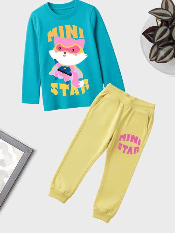 Unisex kids mini star theme jogger set made from soft cotton, featuring adorable star prints for everyday comfort.