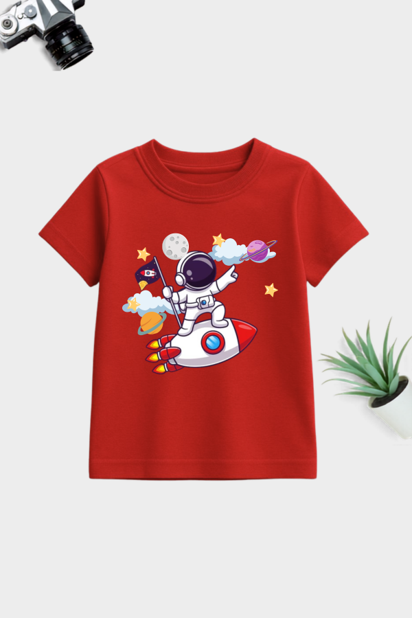 Fun astronaut riding rocket printed cotton t-shirt for kids. Soft, breathable, premium quality and available in 8 vibrant shades.