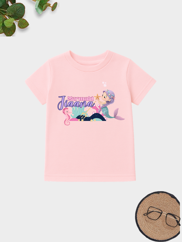 Personalized mermaid name printed cotton t-shirt for kids with colorful underwater artwork.