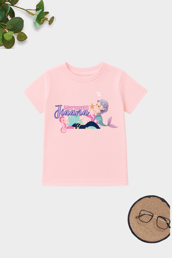 Personalized mermaid name printed cotton t-shirt for kids with colorful underwater artwork.