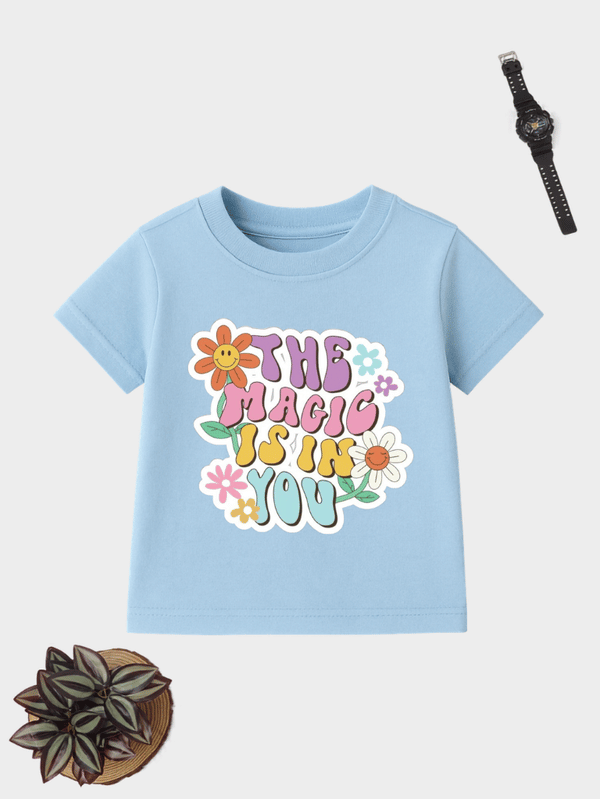 The Magic Is In You floral typography kids cotton T-shirt with colourful graphic.